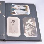 Postcard album, containing approximately one hundred and twenty-two photograph,