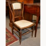 Pair of Edwardian spindle back nursing chairs, width 38cm.