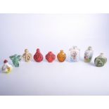 Chinese reverse decorated glass snuff bottle, 8cm; and eight other snuff bottles.