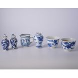 Pair of small Chinese blue and white covered vases, baluster shape,