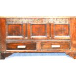 Joined oak mule chest, in part 18th Century, rectangular top above a carved frieze, initialled M.B.