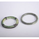 Metal mounted Jadeite bangle, and another Jadeite bangle.