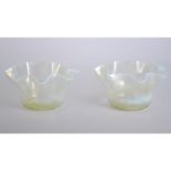 Pair of Edwardian vaseline glass bowls, each with wavy rims, height 7cm.