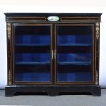 Napoleon III ebonised and gilt metal mounted credenza, with a sevres porcelain inset to the frieze,