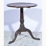 Georgian mahogany tripod table, circular tilt top, turned fluted column, carved and scrolled legs,