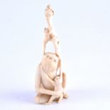 A Cantonese carved ivory group of monkeys, apparently unsigned, 12.5cm.