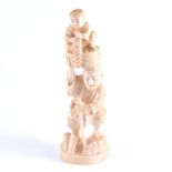 A Japanese carved ivory okimono, a wood cutter and a boy with a basket of fruit, Meiji,