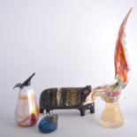 Treacle glazed earthenware model of a cat, 14cm; and a small collection of art glass.