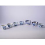 Collection of Chinese blue and white tea bowls and saucers, together with four cups.