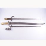 French bayonet, St Etienne 1872, 56cm blade, another French bayonet and a socket bayonet,