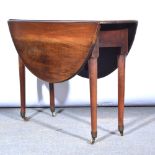 George III mahogany drop leaf table, oval top, gateleg action, tapering legs, 57cm x 102cm.