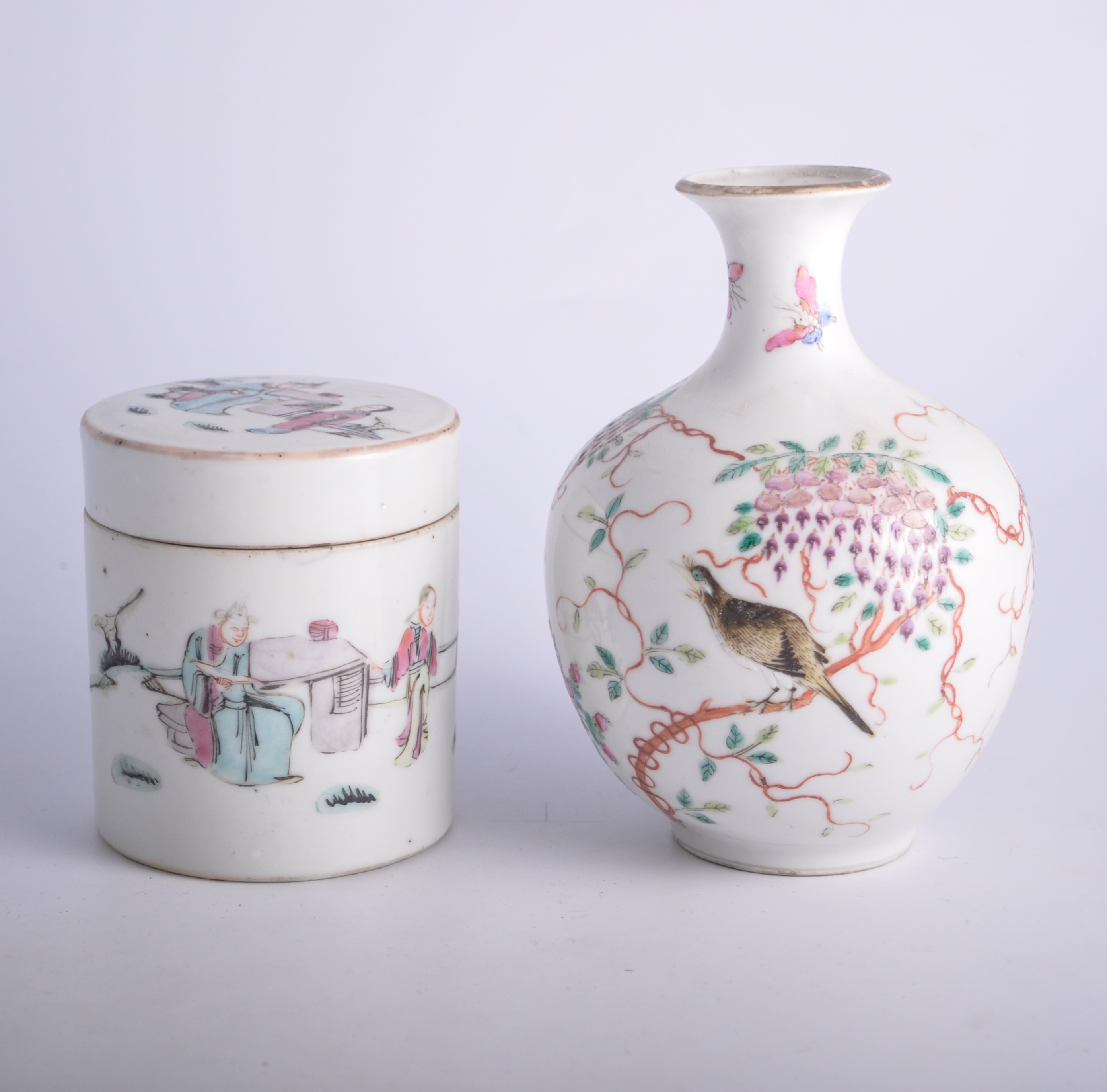 Chinese famille rose bottle vase, decorated with a bird and flowing foliage,