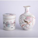 Chinese famille rose bottle vase, decorated with a bird and flowing foliage,