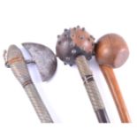 African hardwood knobkerrie, the head with brass pins, wire bound shaft,