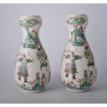 Pair of Chinese famille vert gourd shape vases, decorated with bowman and other figures,