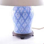 Pair of modern Chinese blue and white vase shape lamp bases, each with shade,