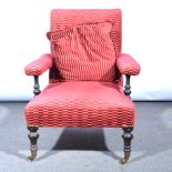 Victorian ebonised easy chair, with red upholstery, width 73cm.
