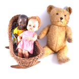 Gold plush teddy bears and dolls.