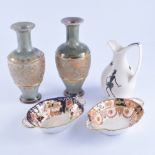 Pair of Doulton stoneware vases, decorated with a floral band,