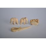 A carved ivory shell with a row of turtles, two character mark, 5cm,