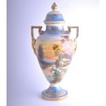 Noritake vase and cover, urn-shape form, twin handles, painted with a cottage by a river,