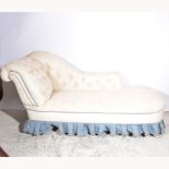 Chaise longue, scrolled back and rail, square tapering stained wood legs,