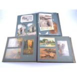 An album of postcards, some World War , greetings, embroidered, topographical, comic,