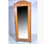 Edwardian oak single wardrobe, carved frame, mirror door, width 77cm, depth 56cm, height 197cm.