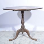 Oak supper table, 19th Century, circular tilt top, turned column, tripod legs, diameter 87cm,