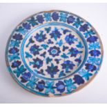 Isnik style plate, Turkish, probably 19th Century, floral decoration in colours, diameter 26cm.
