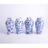 Two similar blue and white shouldered vases, bearing Kangxi four-character marks,