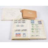Stamp albums, covers, etc.