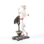 Chelsea Albany bronze and porcelain Art Deco style figure, modelled as a lady taking a stroll,