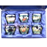 Anji Davenport for Moorcroft Pottery, a boxed set of six 'Farmyard' egg cups, 1999,