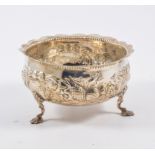 Victorian silver sugar basin, raised on three shell feet, embossed decoration, by Holland,