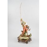 Capodimonte figure, 'Salmon Fishing', gilt metal base, 59cm.