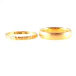 Two 22 carat yellow gold wedding bands, a 4.