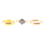 Three gold rings, a plain polished 22 carat gold wedding band, 3.8mm wide, approximate weight 2.