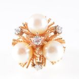 A cultured pearl and diamond dress ring,