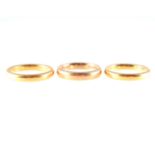 Three 22 carat yellow gold wedding bands, 3m and 3,5mm wide, plain polished finish,