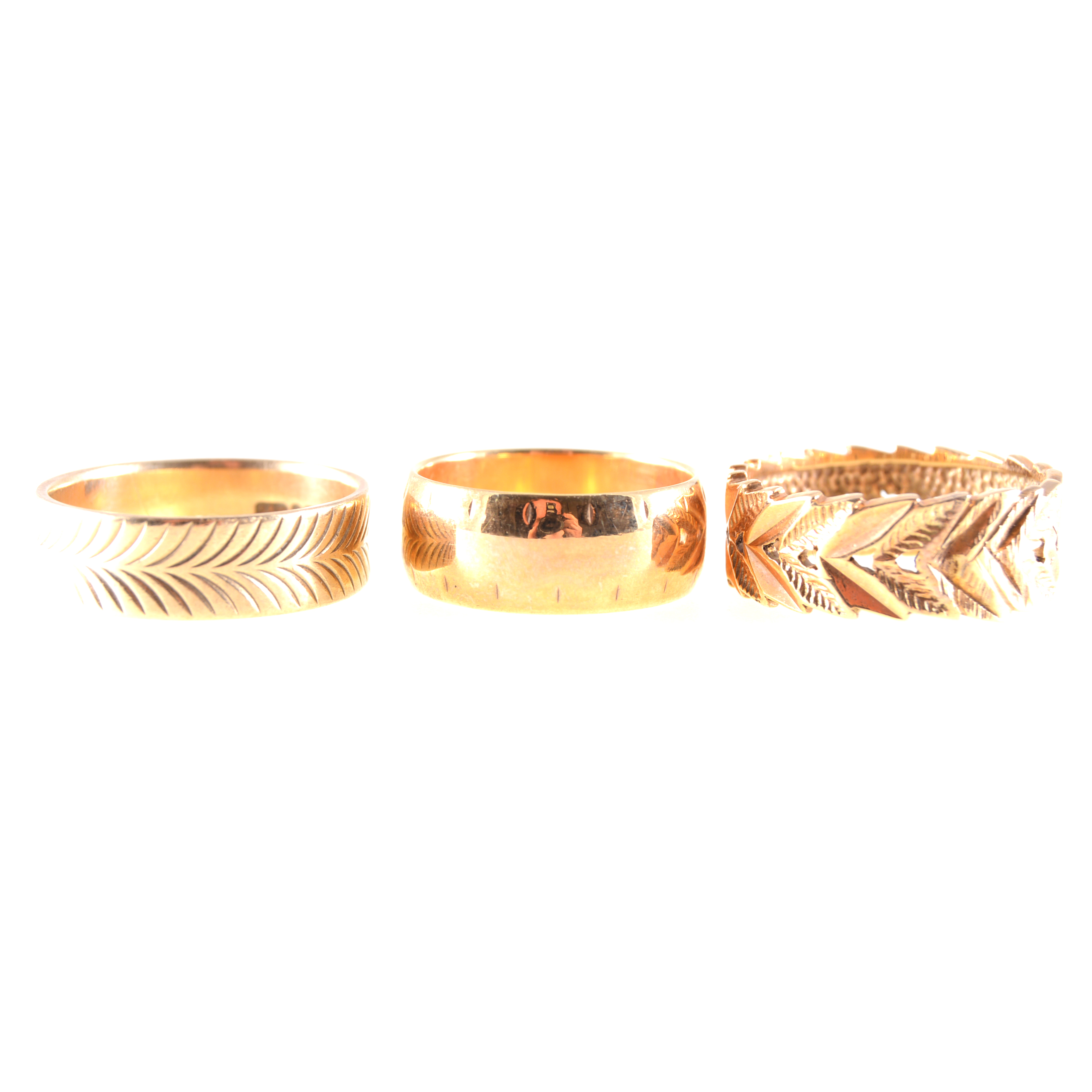 Three 9 carat yellow gold fancy wedding rings, a 7.