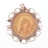 A Half Sovereign pendant and chain,