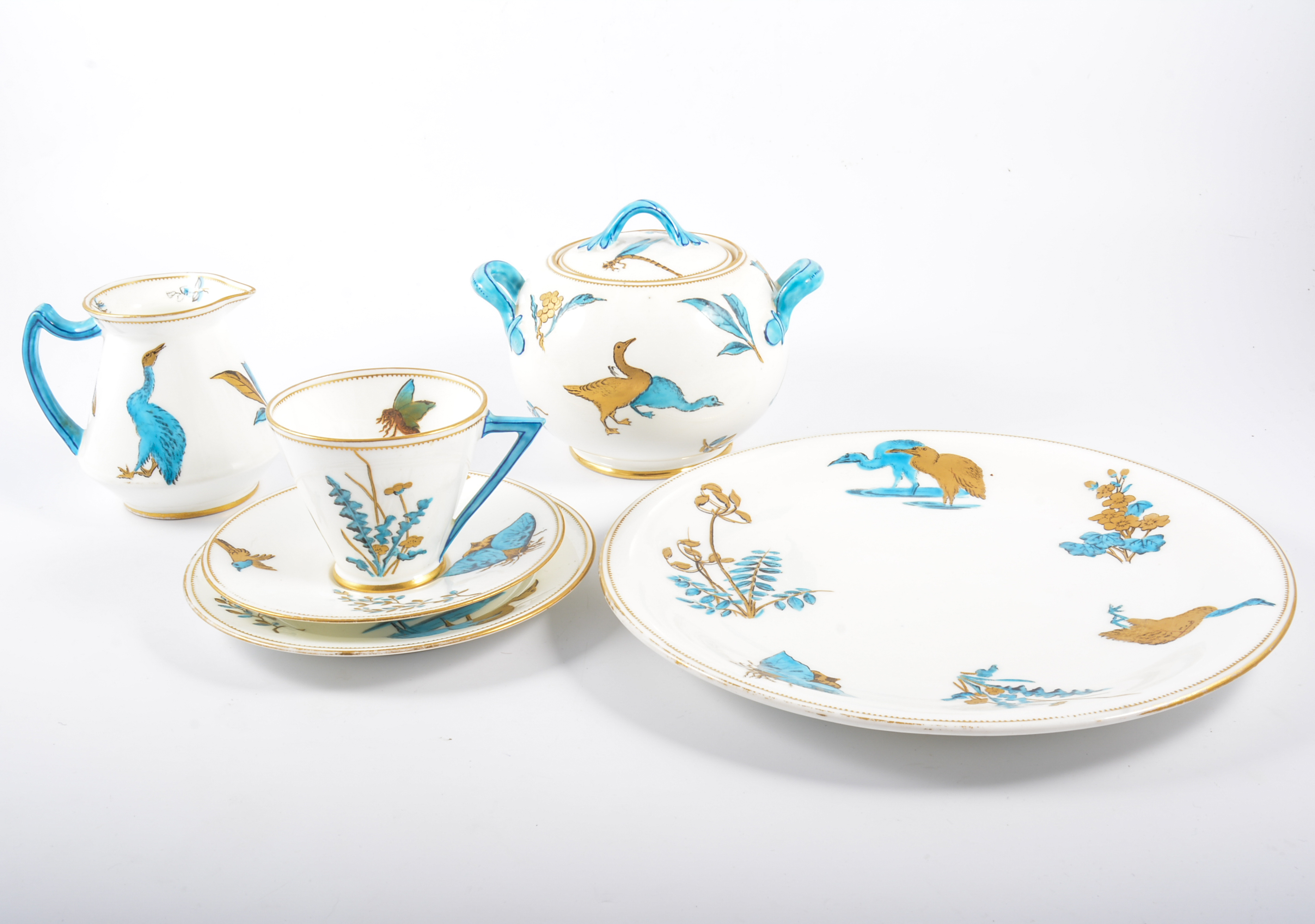 A Victorian aesthetic movement china part teaset in the style of Minton,