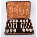 A set of twelve Victorian silver teaspoons, with matched sugar tongs, by John Edward Bingham,
