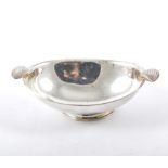 An oval silver dish by Leslie Gordon Durbin, London 1979, plain oval form with shell handles, 5oz.