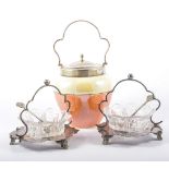 A pair of Edwardian electroplated sugar baskets, with moulded glass bowls,