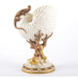 A Worcester posy vase, modelled as a conch shell and lizard, painted and highlighted in gilt,