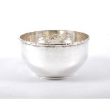 Danish silver circular bowl, circa.1920, hammered finish, cast rim, 5oz, diameter 13cm.