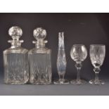 A pair of cut glass square decanters and stoppers,