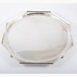 Octagonal silver salver, by Edward Barnard & Sons Limited, London 1930, plain moulded outlines,